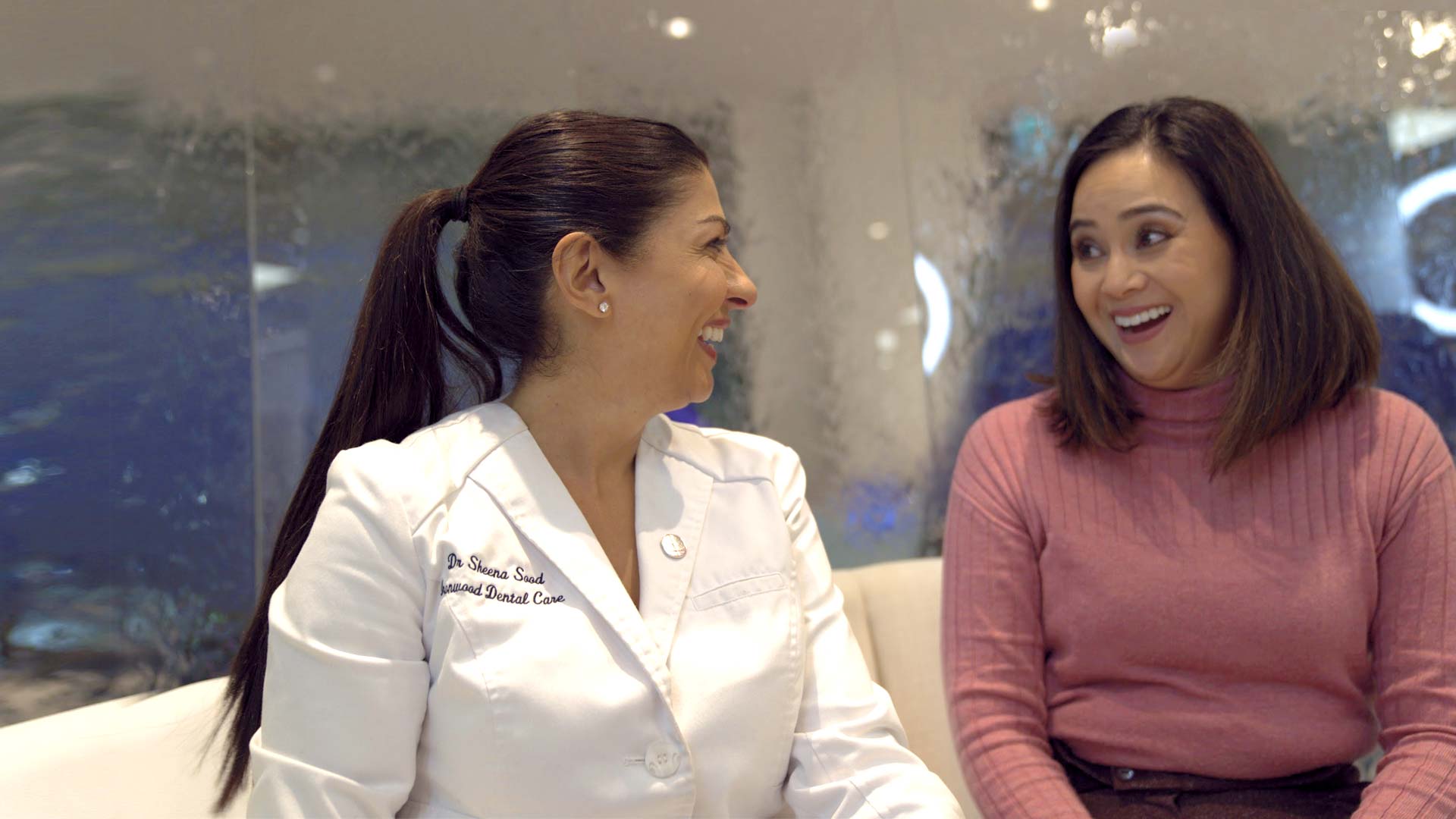 Dr Sheena Sood talking with a Digital Smile Design patient at Ironwood Dental Care.