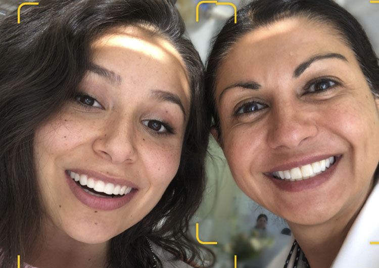 Dentist Dr Sheena Sood smiling next to a young woman showing how a Lite Dentistry smile could look.